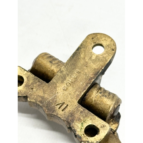 210 - A pair of vintage brass Copley trunk pulls. 10x9cm