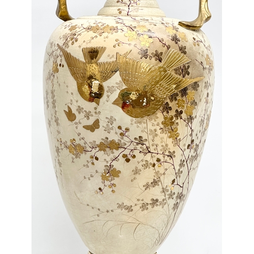 143 - A very large Late 19th Century hand painted gilt and enamel baluster vase, with gilt foliage handles... 