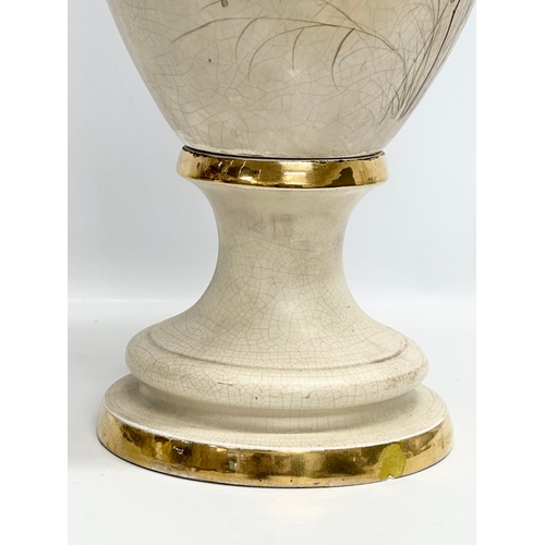 143 - A very large Late 19th Century hand painted gilt and enamel baluster vase, with gilt foliage handles... 