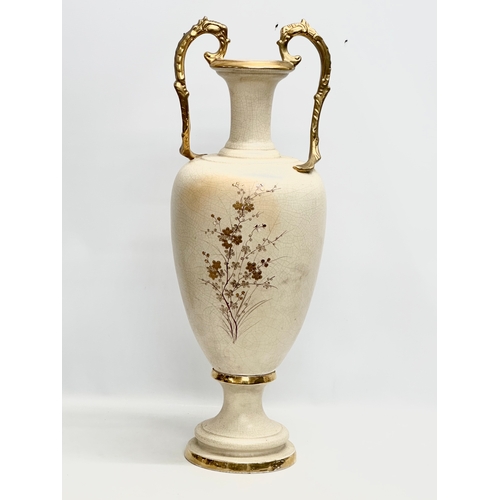 143 - A very large Late 19th Century hand painted gilt and enamel baluster vase, with gilt foliage handles... 