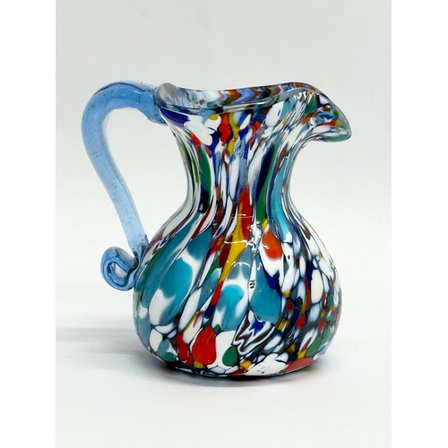 119 - A Mid 20th Century Murano glass jug. In the manner of Fratelli Toso. 11x9x11cm.