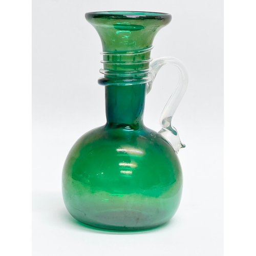 120 - A Mid 20th Century Murano Glass jug form vase. 16cm.