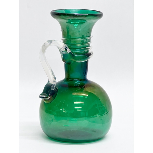 120 - A Mid 20th Century Murano Glass jug form vase. 16cm.