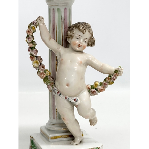 80 - A Late 19th Century German hand painted pottery figural, reticulated compote. 21x18x31cm.