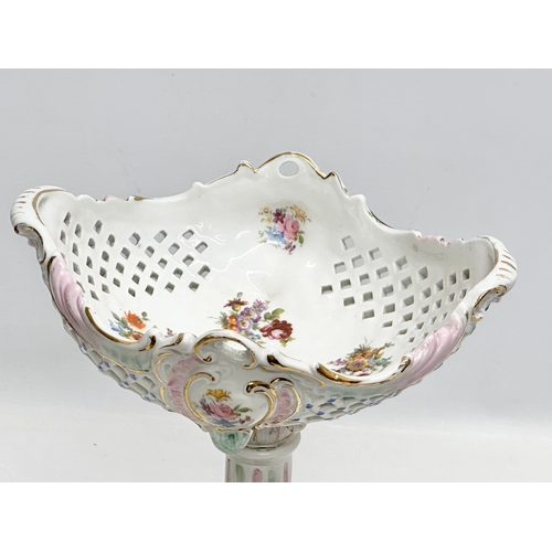 80 - A Late 19th Century German hand painted pottery figural, reticulated compote. 21x18x31cm.