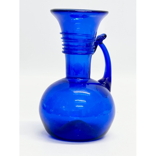 221 - A Mid 20th Century Georgian style Bristol Blue jug. 16cm