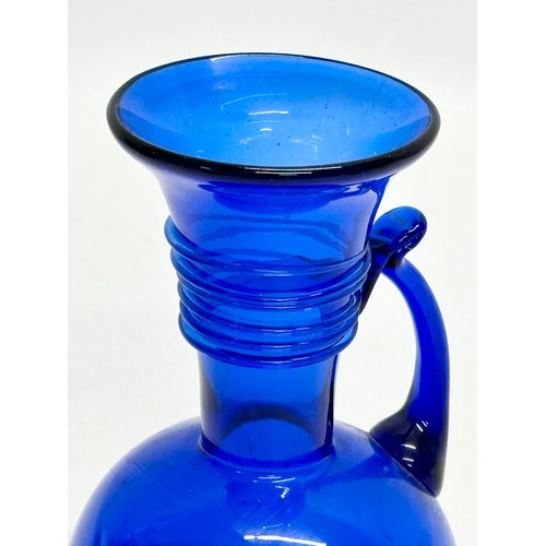 221 - A Mid 20th Century Georgian style Bristol Blue jug. 16cm