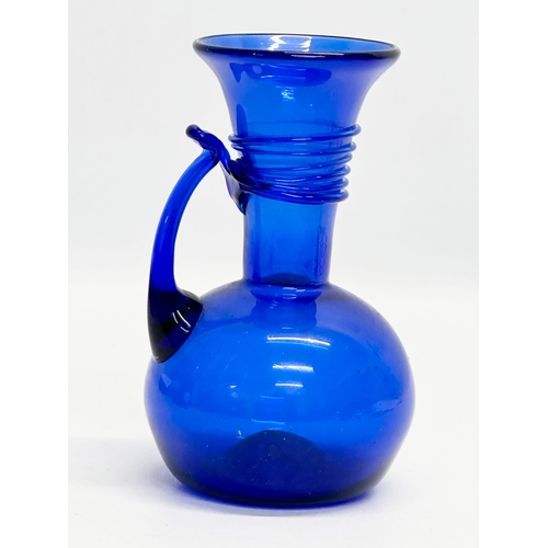 221 - A Mid 20th Century Georgian style Bristol Blue jug. 16cm