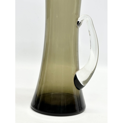 244 - A tall 1960’s Whitefriars smoked glass pitcher. 37cm