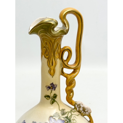 265 - An Early 20th Century Alexandra Porcelain Works “Royal Vienna” pitcher form vase. 20cm