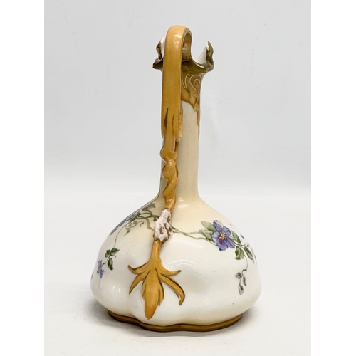 265 - An Early 20th Century Alexandra Porcelain Works “Royal Vienna” pitcher form vase. 20cm