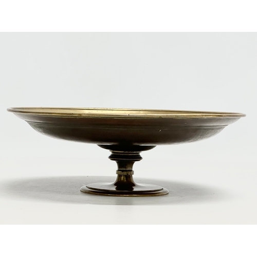 31 - Elkington & Co. A Late 19th Century copper and brass centrepiece tazza, with classical design relief... 