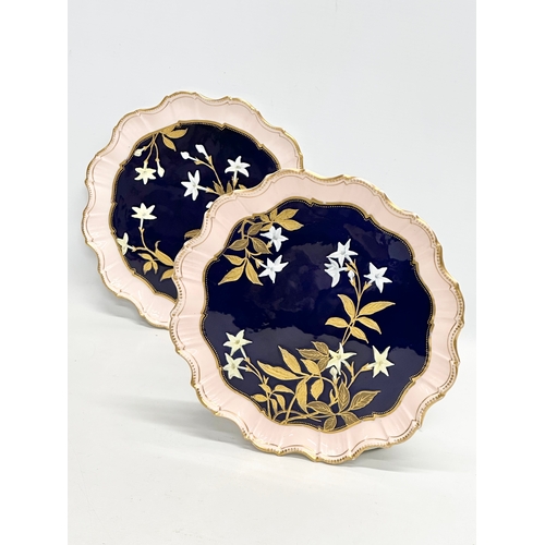 214 - A pair of fine quality Early 20th Century painted enamel cabinet plates with scalloped rims. Aynsley... 