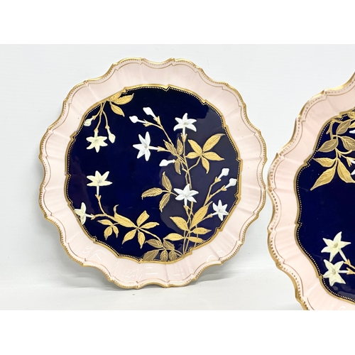 214 - A pair of fine quality Early 20th Century painted enamel cabinet plates with scalloped rims. Aynsley... 