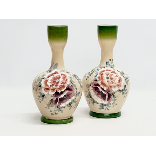 148 - A pair of Late 19th Century Bohemian opaline glass vases. 27cm