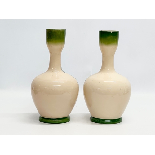 148 - A pair of Late 19th Century Bohemian opaline glass vases. 27cm