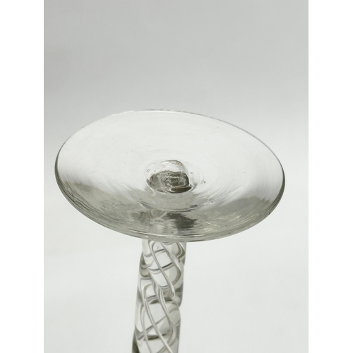 108A - A tall Late 19th Century Victorian twist stem wine glass. In the Georgian style. 22cm.