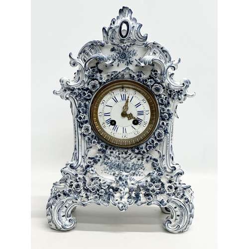 20 - Parkinson & Frodsham. A large Late 19th Century 3 piece flower encrusted porcelain clock set with 2 ... 