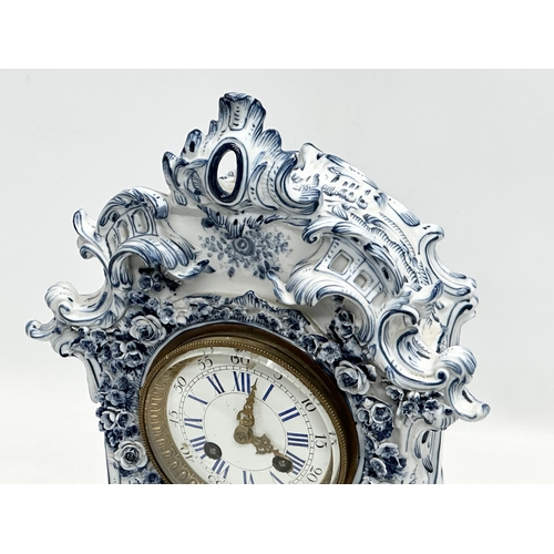 20 - Parkinson & Frodsham. A large Late 19th Century 3 piece flower encrusted porcelain clock set with 2 ... 