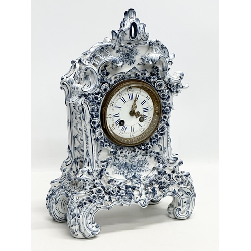 20 - Parkinson & Frodsham. A large Late 19th Century 3 piece flower encrusted porcelain clock set with 2 ... 