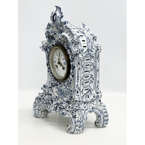 20 - Parkinson & Frodsham. A large Late 19th Century 3 piece flower encrusted porcelain clock set with 2 ... 