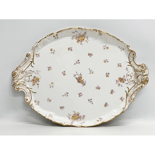 215 - G Demartine & Co. A Late 19th/Early 20th Century French porcelain serving tray. Limoges, France. 48x... 