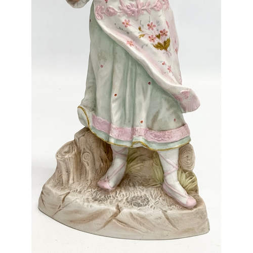 279 - Heubach. A Late 19th Century German bisque figurine. By Heubach. Marked. 34.5cm.