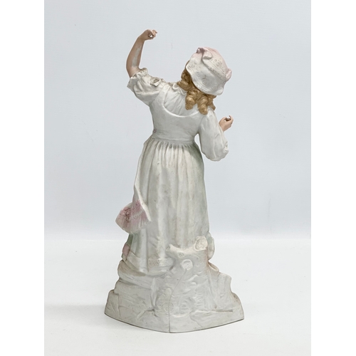 279 - Heubach. A Late 19th Century German bisque figurine. By Heubach. Marked. 34.5cm.