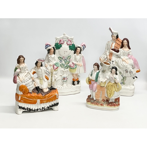 326 - Four 19th Century Victorian Staffordshire Pottery figures. 35cm. 31cm. 27cm. 22cm.