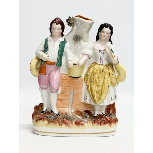 326 - Four 19th Century Victorian Staffordshire Pottery figures. 35cm. 31cm. 27cm. 22cm.