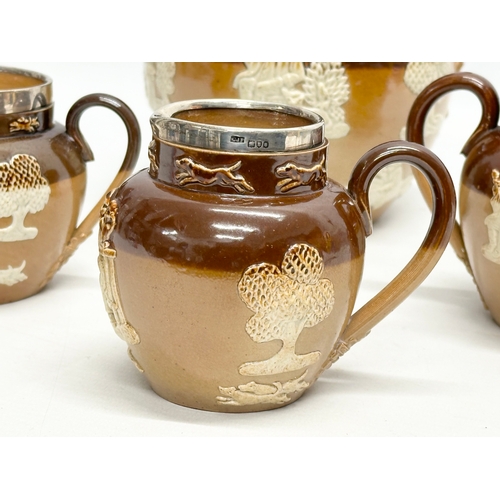 284 - Silver mounted. Four pieces of Late 19th Century Doulton Lambeth Harvest jugs and bowls, with silver... 