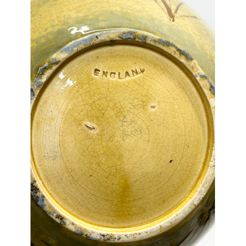 371 - Burmantofts. A Late 19th Century English glazed pottery jardiniere. 21x16cm.