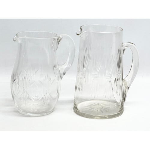 323 - A collection of 19th Century Victorian glassware. A near pair of Victorian water jugs 19cm, 17cm. Ma... 