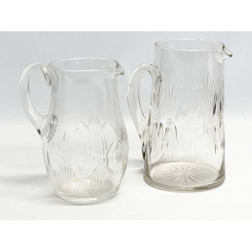 323 - A collection of 19th Century Victorian glassware. A near pair of Victorian water jugs 19cm, 17cm. Ma... 