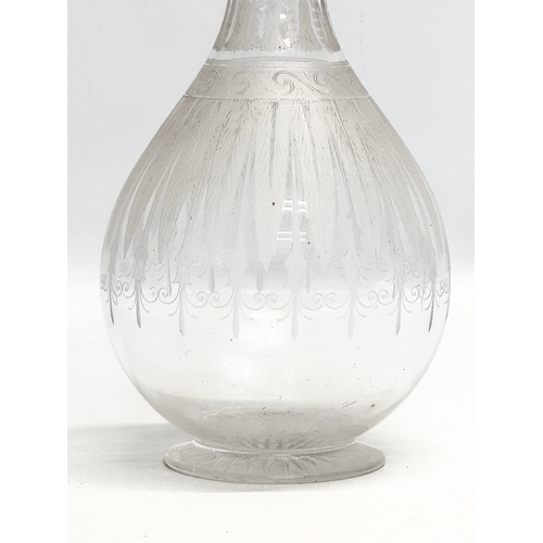 100 - Cartwright & Woodward. A 19th Century Victorian silver mounted, etched glass decanter. 1860’s. 30cm.