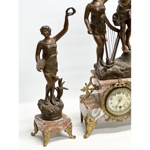 32 - A large Late 19th Century three piece French marble and bronzed spelter figural clock set, with gilt... 