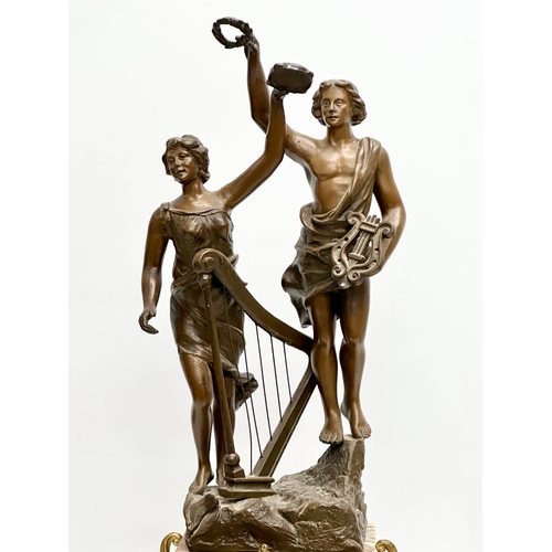 32 - A large Late 19th Century three piece French marble and bronzed spelter figural clock set, with gilt... 