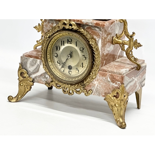 32 - A large Late 19th Century three piece French marble and bronzed spelter figural clock set, with gilt... 