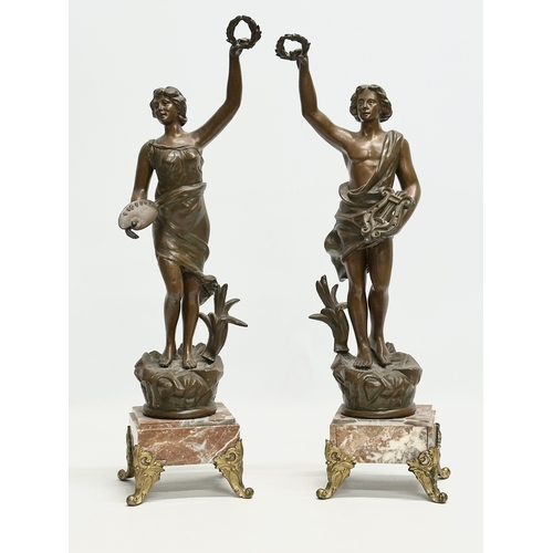 32 - A large Late 19th Century three piece French marble and bronzed spelter figural clock set, with gilt... 