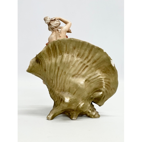 277 - Royal Dux. An Early 20th Century Art Nouveau figural centrepiece conch shell bowl. 21x14x24cm.