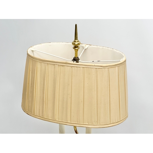 294 - A Late 20th Century faux horn and brass table lamp. 34x13x70cm