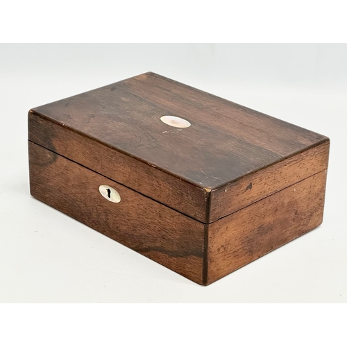 301 - A Victorian rosewood and mother of pearl jewellery box/storage box. 25x17x9.5cm