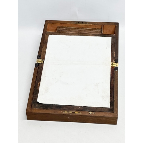 334 - A Victorian mahogany writing slope. Closed 30x22x14cm.