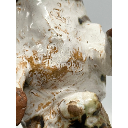 172 - Paula Humphris. A studio pottery glazed stoneware bull. Designed by Paula Humphris. 29cm