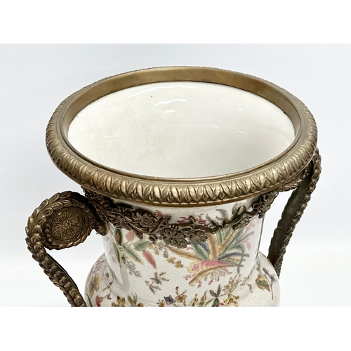 377 - Wong Lee 1895. Two large pieces of Late 20th Century brass mounted pottery. A footed centre piece 32... 