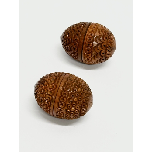 274 - Two 19th Century coquilla nut pomanders