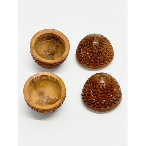 274 - Two 19th Century coquilla nut pomanders