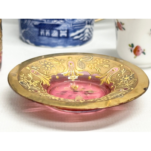 392 - A collection of pottery and glass. A Moser Glass gilt cranberry liqueur glass and saucer, Wedgwood c... 