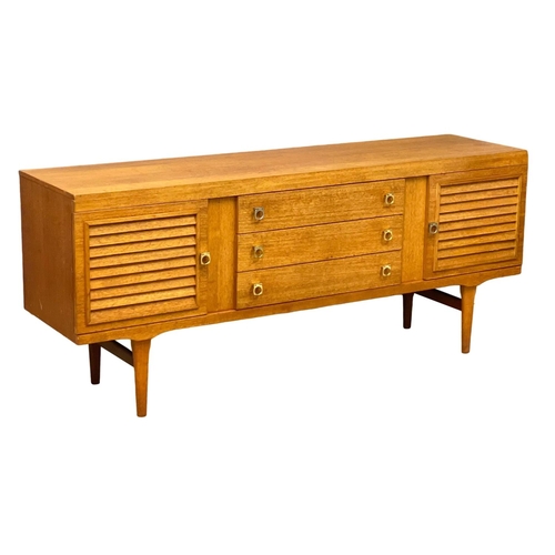 345 - A Mid Century teak sideboard by Elliotts of Newbury.  172x44x72.5cm. 5