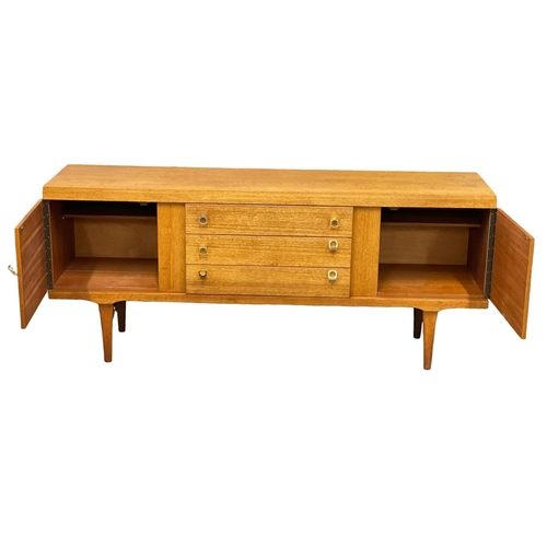 345 - A Mid Century teak sideboard by Elliotts of Newbury.  172x44x72.5cm. 5